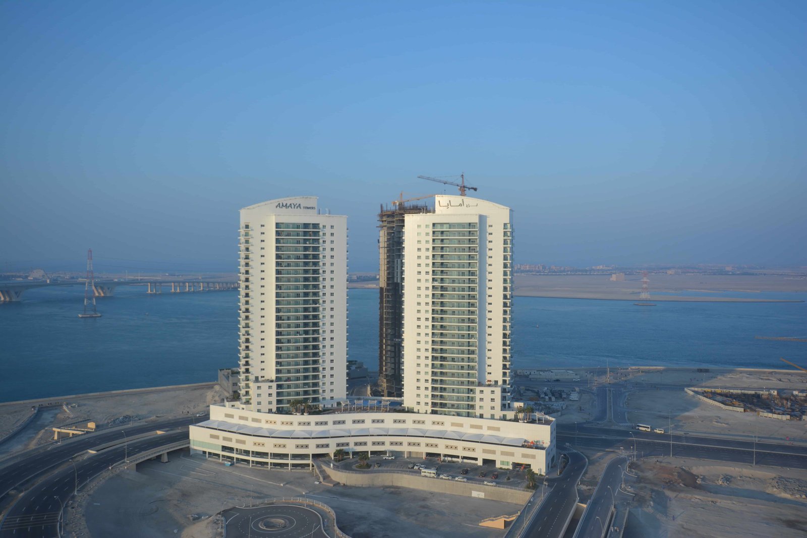 Front exterior view of Amaya Towers on Al Reem Island, Abu Dhabi, showcasing luxury waterfront residential towers.